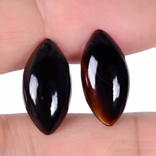זוג אוניקס שחור Onyx מלוטש לשיבוץ במידה: 10*19 מ"מ ליטוש קבושון