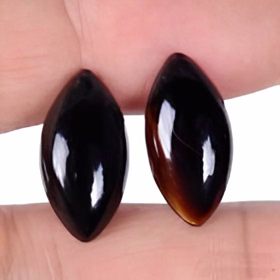 זוג אוניקס שחור Onyx מלוטש לשיבוץ במידה: 10*19 מ"מ ליטוש קבושון