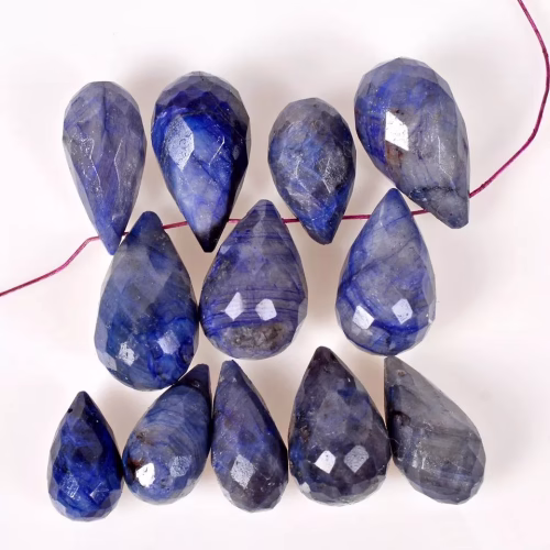 ספיר Sapphire מלוטש לשיבוץ טיפה עם חור מידה: 14-16 מ"מ במשקל: 8-9 קרט